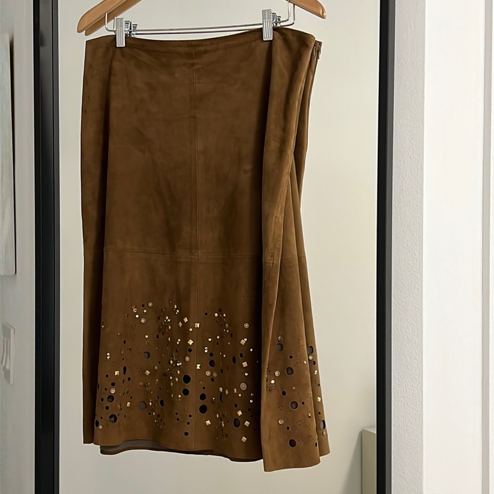 100% suede a-line skirts in a rich tan color with design style bottom